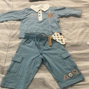 Light Blue Polo Shirt with White Collar and Patches